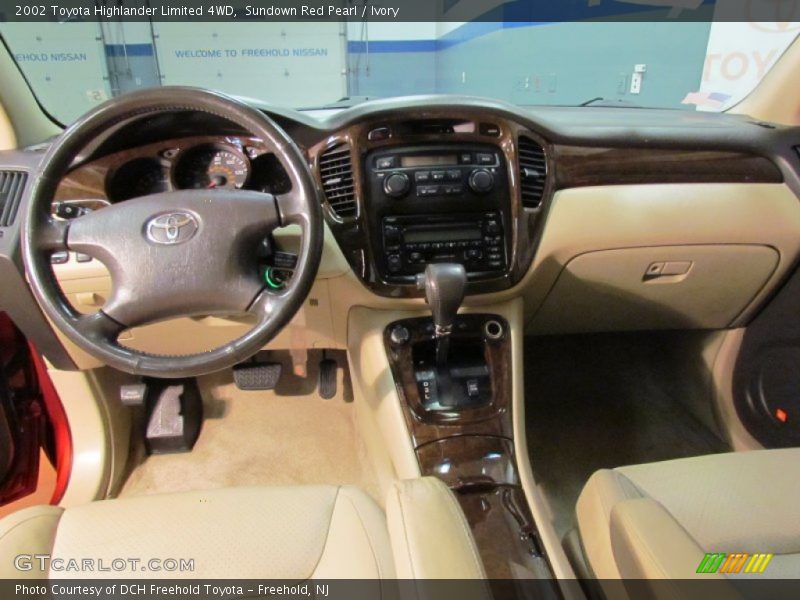 Sundown Red Pearl / Ivory 2002 Toyota Highlander Limited 4WD