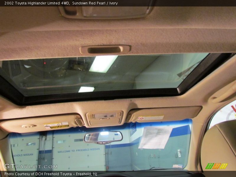 Sundown Red Pearl / Ivory 2002 Toyota Highlander Limited 4WD