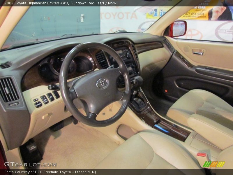 Sundown Red Pearl / Ivory 2002 Toyota Highlander Limited 4WD
