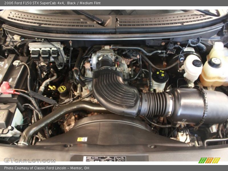 Black / Medium Flint 2006 Ford F150 STX SuperCab 4x4