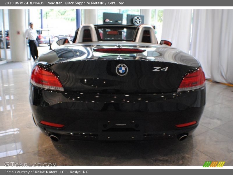 Black Sapphire Metallic / Coral Red 2010 BMW Z4 sDrive35i Roadster