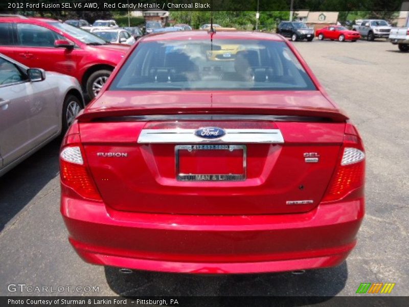 Red Candy Metallic / Charcoal Black 2012 Ford Fusion SEL V6 AWD