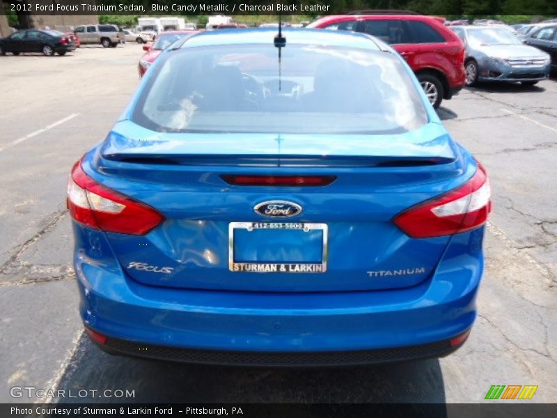 Blue Candy Metallic / Charcoal Black Leather 2012 Ford Focus Titanium Sedan