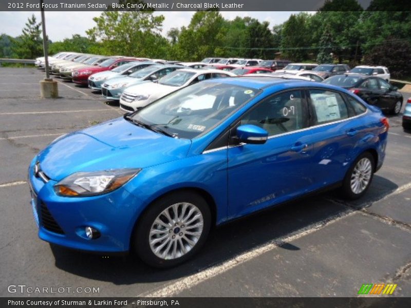 Blue Candy Metallic / Charcoal Black Leather 2012 Ford Focus Titanium Sedan