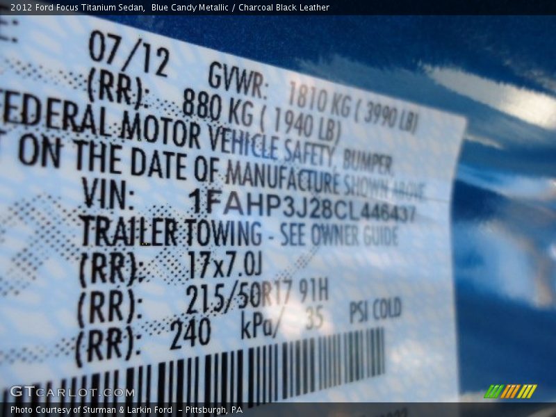 Blue Candy Metallic / Charcoal Black Leather 2012 Ford Focus Titanium Sedan