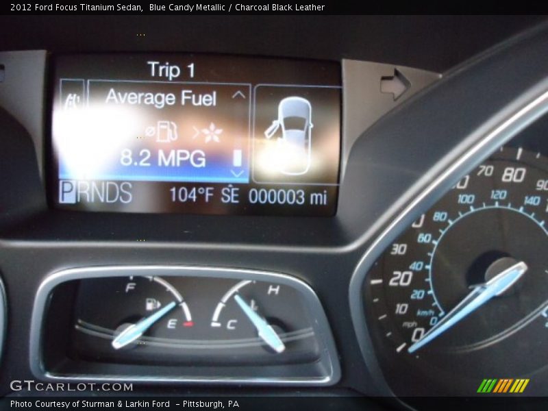 Blue Candy Metallic / Charcoal Black Leather 2012 Ford Focus Titanium Sedan