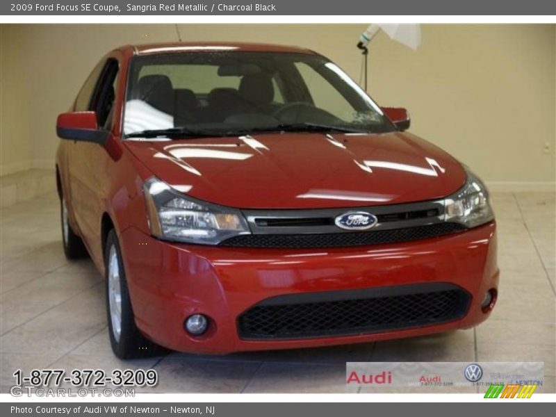 Sangria Red Metallic / Charcoal Black 2009 Ford Focus SE Coupe
