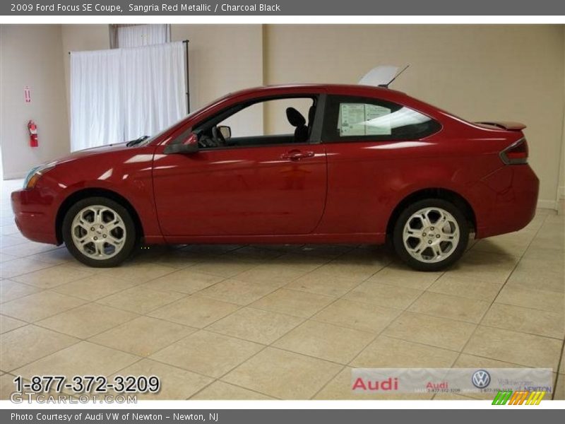 Sangria Red Metallic / Charcoal Black 2009 Ford Focus SE Coupe