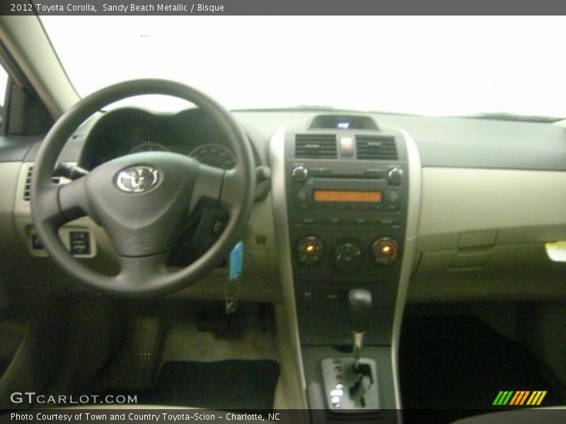 Sandy Beach Metallic / Bisque 2012 Toyota Corolla