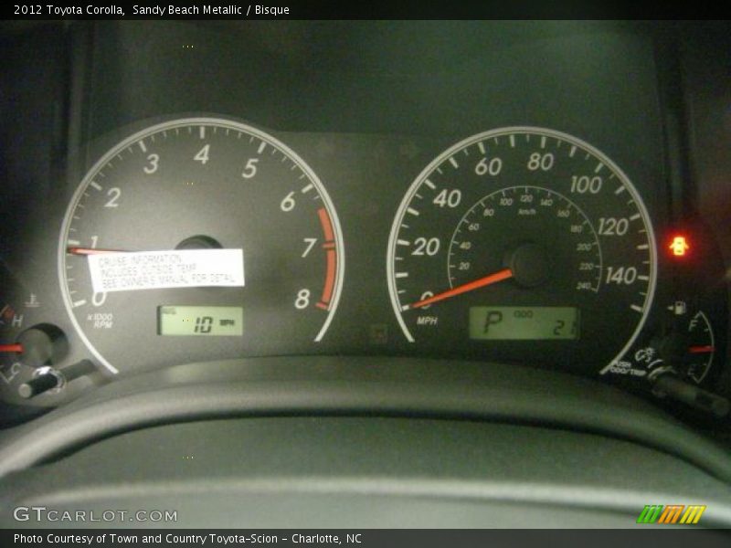 Sandy Beach Metallic / Bisque 2012 Toyota Corolla