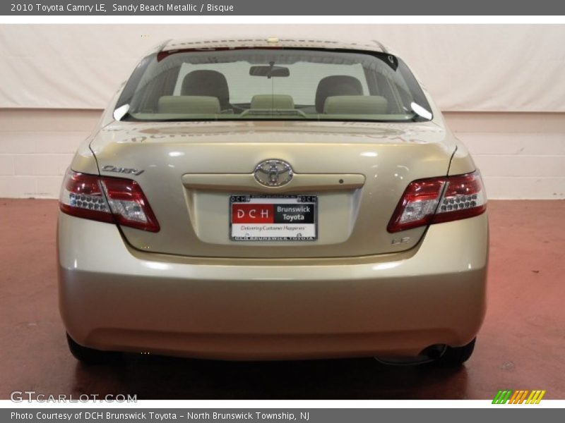 Sandy Beach Metallic / Bisque 2010 Toyota Camry LE