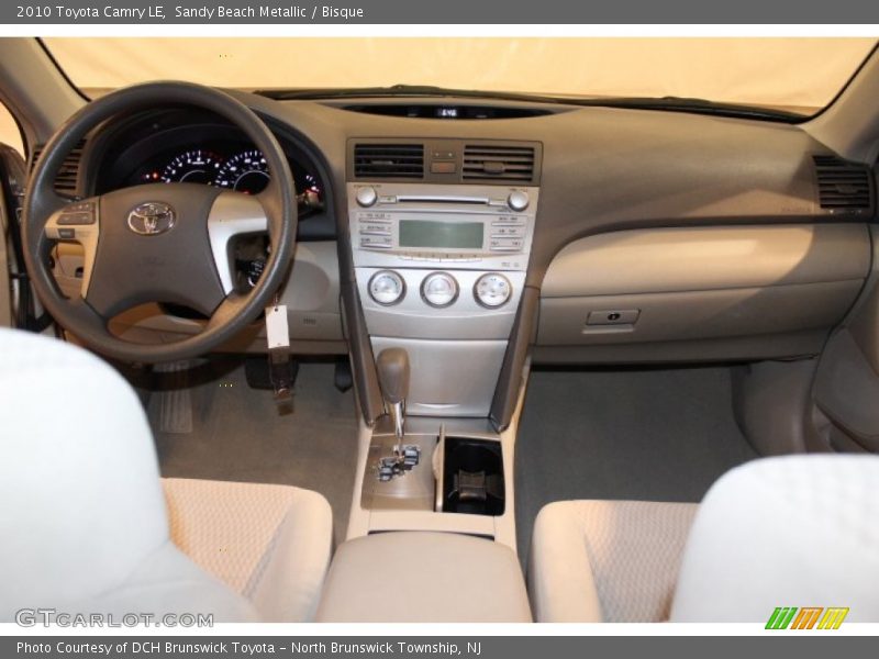 Sandy Beach Metallic / Bisque 2010 Toyota Camry LE
