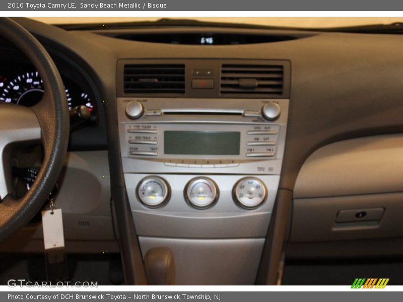 Sandy Beach Metallic / Bisque 2010 Toyota Camry LE