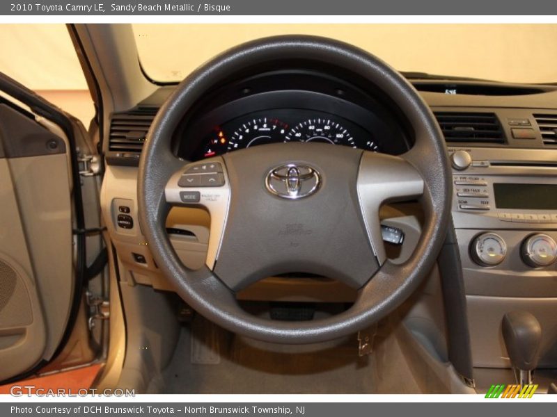 Sandy Beach Metallic / Bisque 2010 Toyota Camry LE