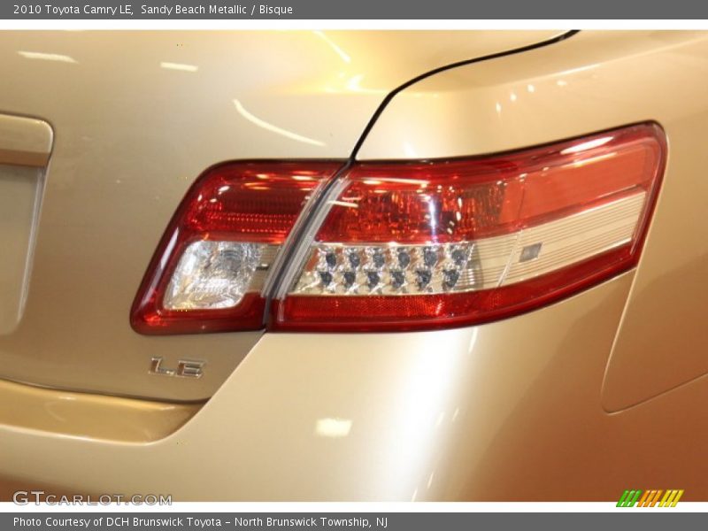 Sandy Beach Metallic / Bisque 2010 Toyota Camry LE