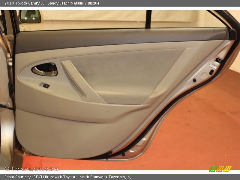 Sandy Beach Metallic / Bisque 2010 Toyota Camry LE