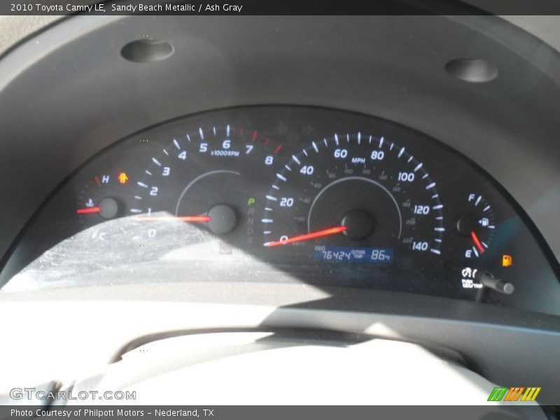 Sandy Beach Metallic / Ash Gray 2010 Toyota Camry LE