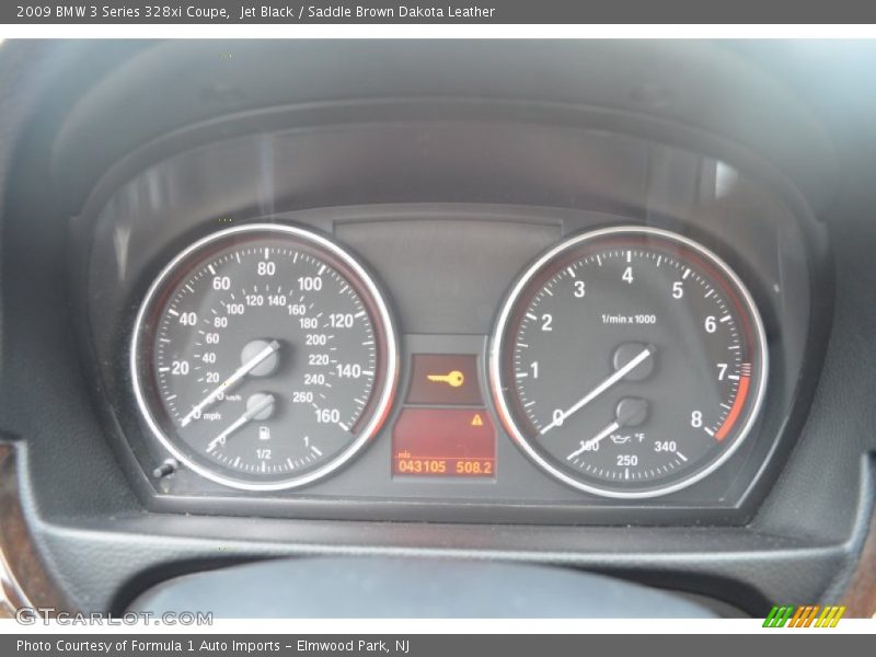 Jet Black / Saddle Brown Dakota Leather 2009 BMW 3 Series 328xi Coupe