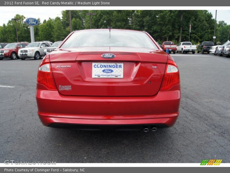 Red Candy Metallic / Medium Light Stone 2012 Ford Fusion SE