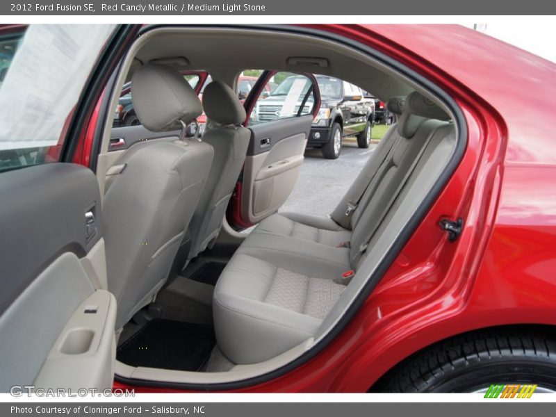 Red Candy Metallic / Medium Light Stone 2012 Ford Fusion SE