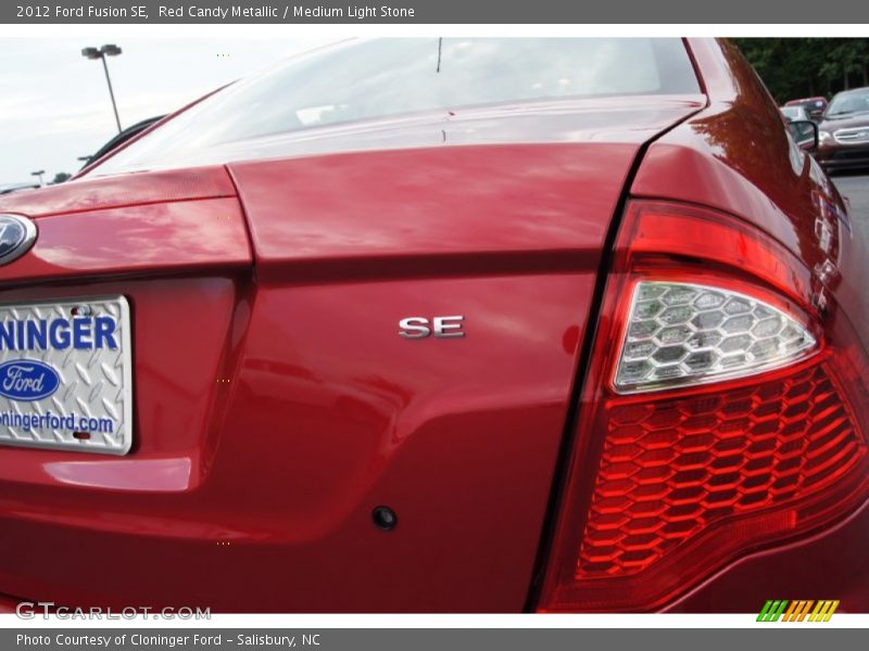 Red Candy Metallic / Medium Light Stone 2012 Ford Fusion SE