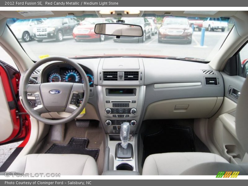 Red Candy Metallic / Medium Light Stone 2012 Ford Fusion SE