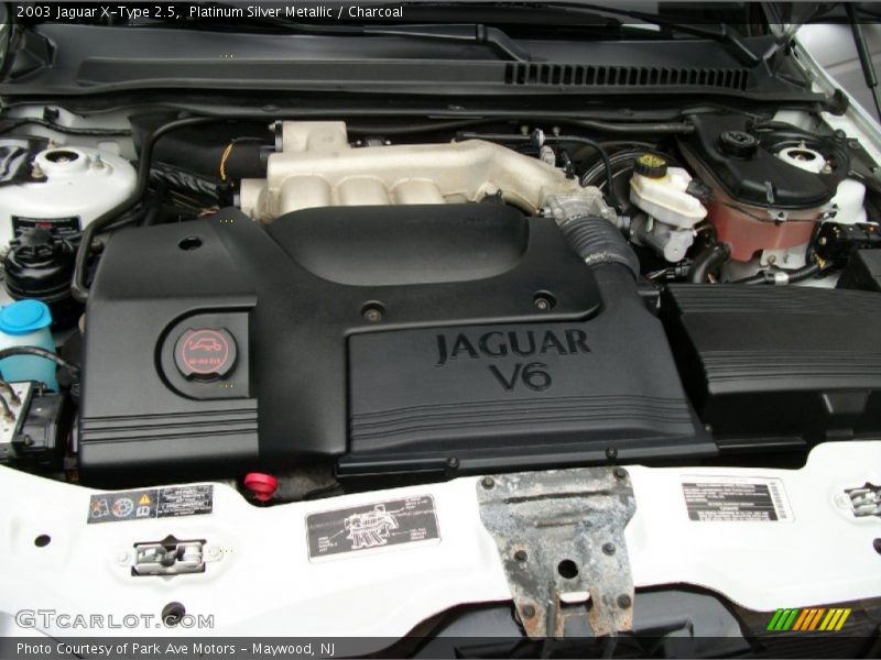 Platinum Silver Metallic / Charcoal 2003 Jaguar X-Type 2.5