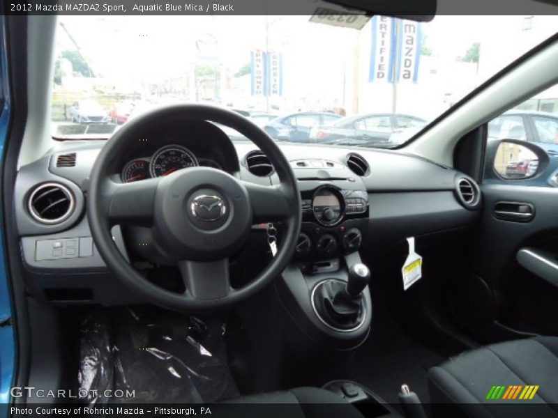 Dashboard of 2012 MAZDA2 Sport