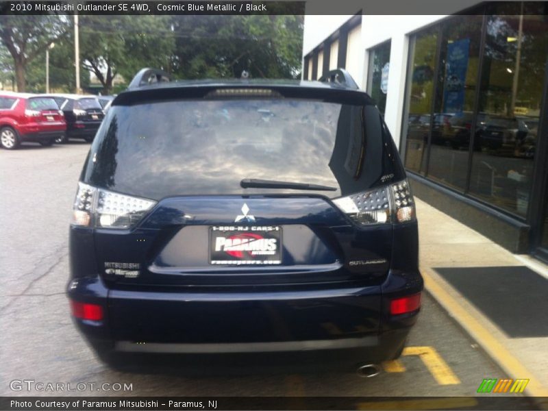 Cosmic Blue Metallic / Black 2010 Mitsubishi Outlander SE 4WD