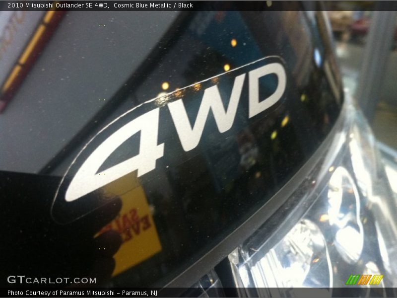 Cosmic Blue Metallic / Black 2010 Mitsubishi Outlander SE 4WD
