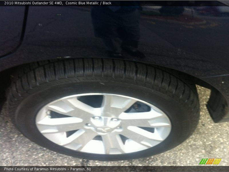 Cosmic Blue Metallic / Black 2010 Mitsubishi Outlander SE 4WD