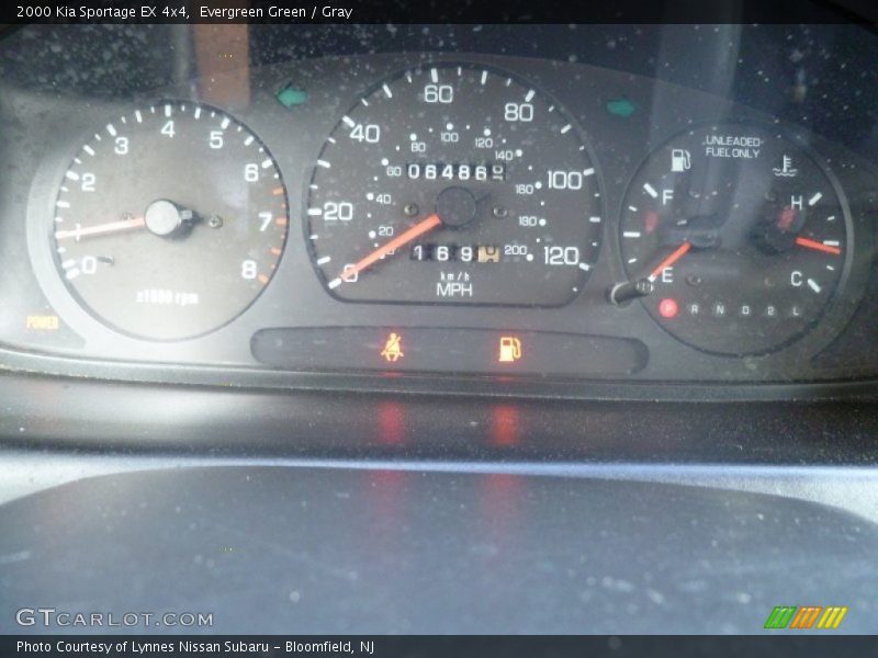 Evergreen Green / Gray 2000 Kia Sportage EX 4x4