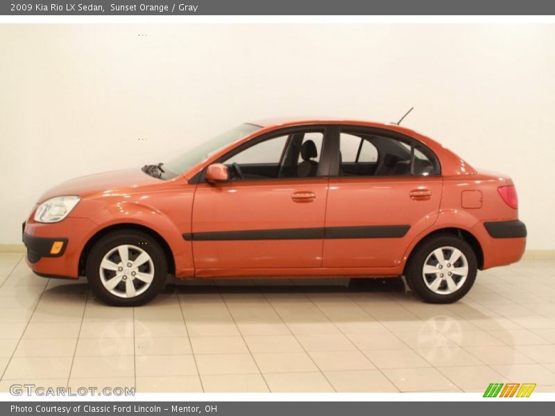  2009 Rio LX Sedan Sunset Orange