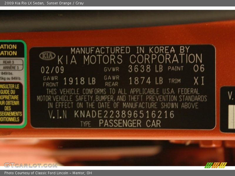 2009 Rio LX Sedan Sunset Orange Color Code 06