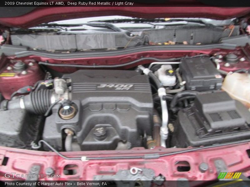 Deep Ruby Red Metallic / Light Gray 2009 Chevrolet Equinox LT AWD