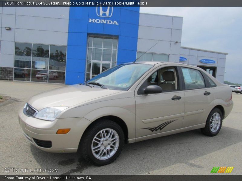 Pueblo Gold Metallic / Dark Pebble/Light Pebble 2006 Ford Focus ZX4 SE Sedan