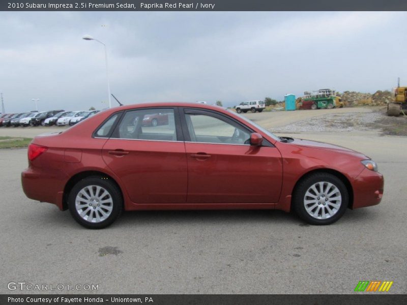 Paprika Red Pearl / Ivory 2010 Subaru Impreza 2.5i Premium Sedan