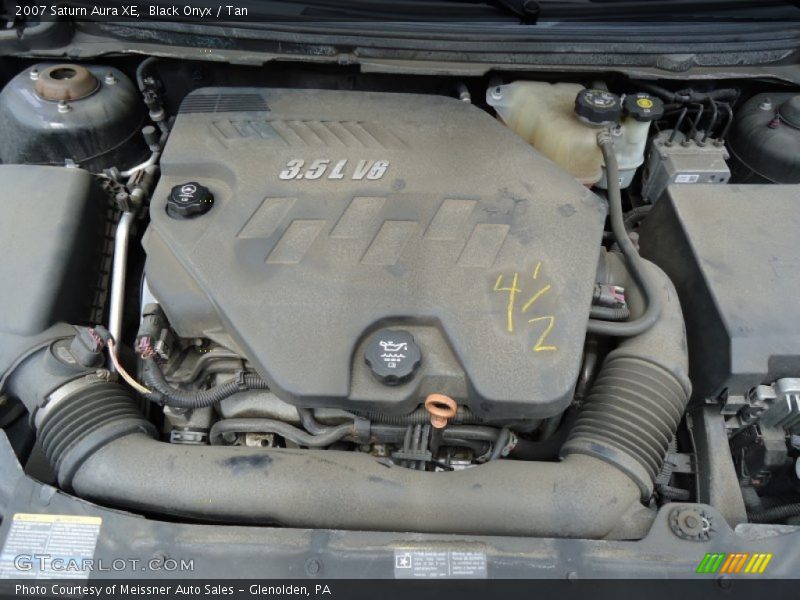 Black Onyx / Tan 2007 Saturn Aura XE