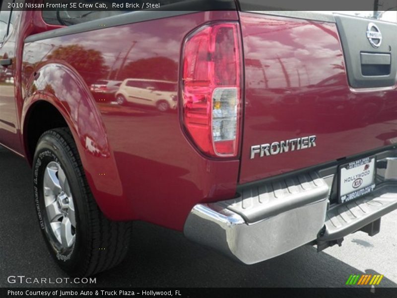 Red Brick / Steel 2010 Nissan Frontier SE Crew Cab
