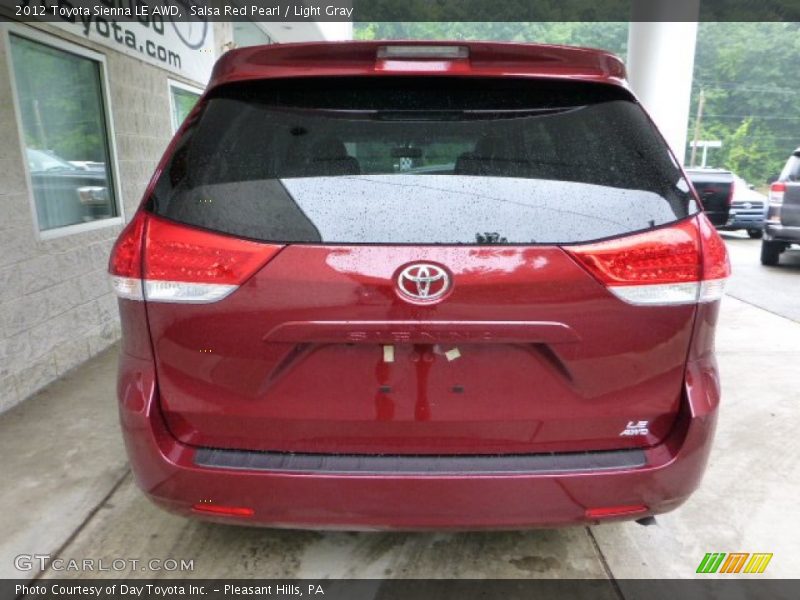 Salsa Red Pearl / Light Gray 2012 Toyota Sienna LE AWD