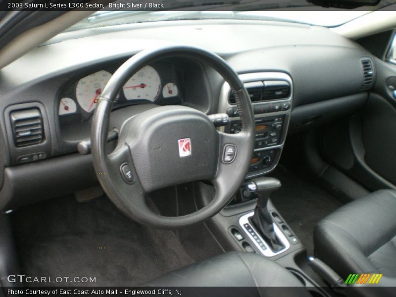 Bright Silver / Black 2003 Saturn L Series L300 Sedan