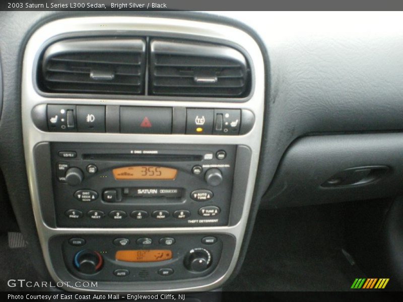 Bright Silver / Black 2003 Saturn L Series L300 Sedan