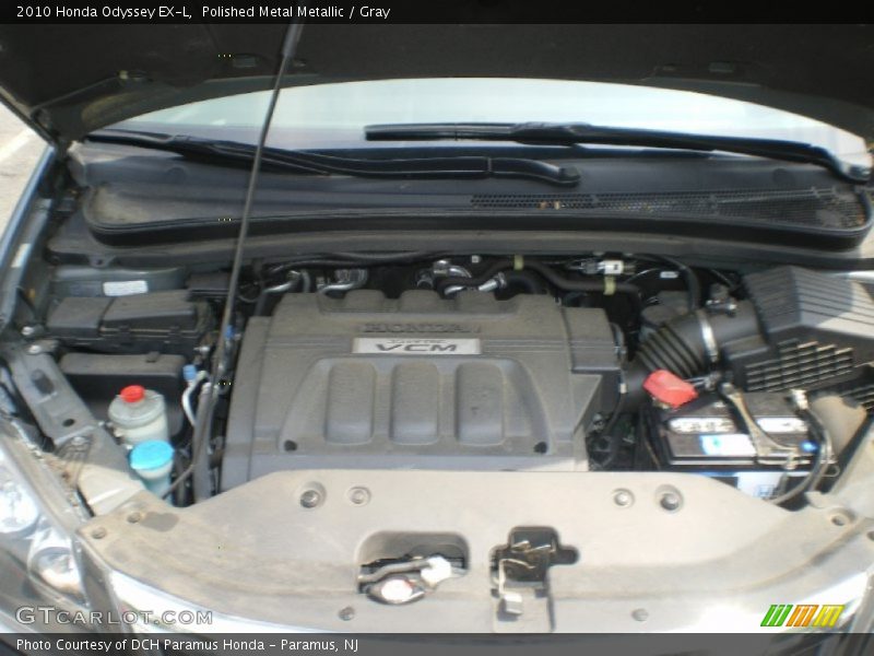 Polished Metal Metallic / Gray 2010 Honda Odyssey EX-L