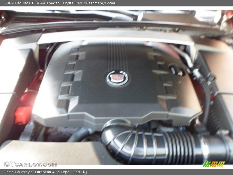 Crystal Red / Cashmere/Cocoa 2009 Cadillac CTS 4 AWD Sedan
