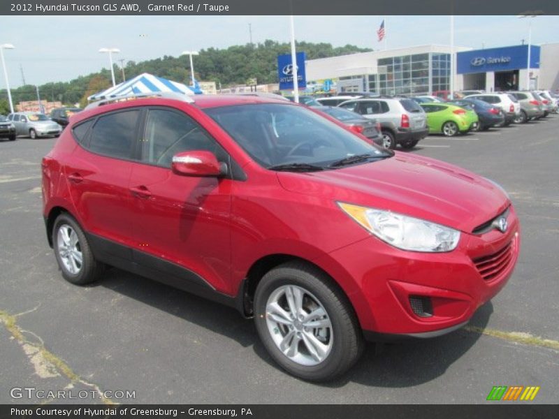 Garnet Red / Taupe 2012 Hyundai Tucson GLS AWD