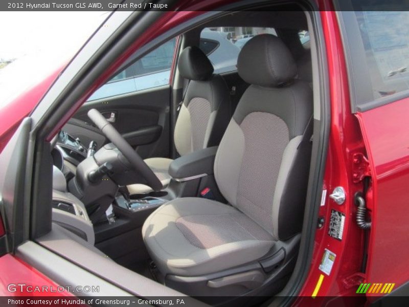 Garnet Red / Taupe 2012 Hyundai Tucson GLS AWD