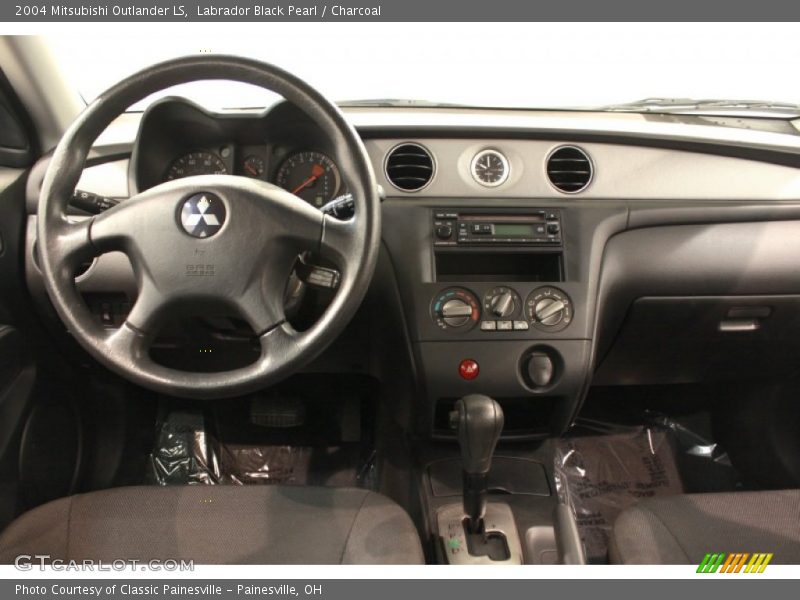 Dashboard of 2004 Outlander LS