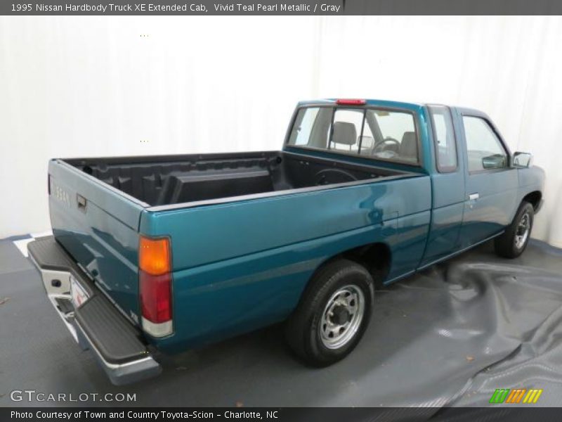 Vivid Teal Pearl Metallic / Gray 1995 Nissan Hardbody Truck XE Extended Cab