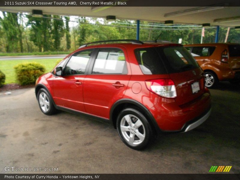 Cherry Red Metallic / Black 2011 Suzuki SX4 Crossover Touring AWD