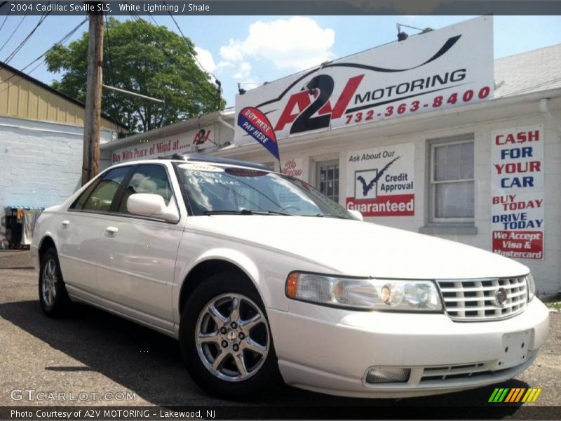 White Lightning / Shale 2004 Cadillac Seville SLS